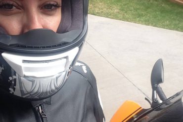 Jennifer Angelina (JA Motogeek) getting ready to ride to class.
