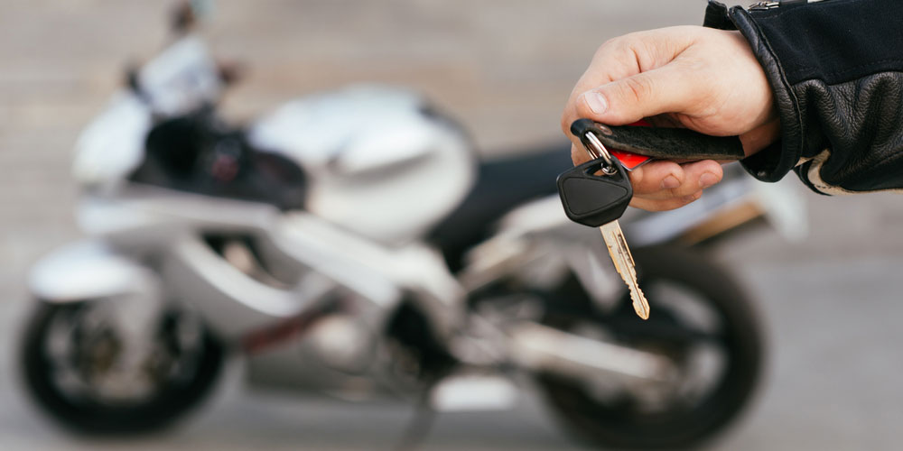 otorcycle key on leather fob
